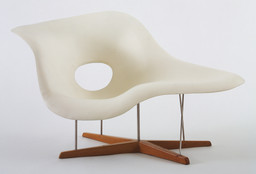 Charles Eames and Ray Eames. Full Scale Model of Chaise Longue (La Chaise). 1948. Hard rubber foam, plastic, wood, and metal, 32 1/2 × 59 × 24 1/4″ (82.5 × 149.8 × 87 cm). The Museum of Modern Art. Gift of the designer