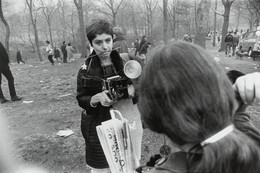 Garry Winogrand. Diane Arbus, Love-In, Central Park, New York City from the portfolio Big Shots. 1969. Gelatin silver print, printed 1983, 12 5/16 x 18 1/2&#34; (31.2 x 47 cm). Purchase and gift of Barbara Schwartz in memory of Eugene M. Schwartz. © The Estate of Garry Winogrand, courtesy Fraenkel Gallery