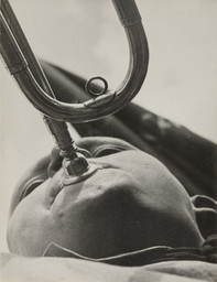 Aleksandr Rodchenko (Russian, 1891–1956). Pioneer with a Bugle. 1930. Gelatin silver print. 9 1/4 × 7 1/16″ (23.5 × 18 cm). The Museum of Modern Art, New York. Gift of the Rodchenko Family