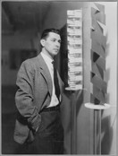 Herbert Bayer at the exhibition Bauhaus: 1919–1928, The Museum of Modern Art, New York, December 7, 1938–January 30, 1939. Gelatin silver print, 7 x 9 1/2&#34; (17.7 x 24.1 cm). The Museum of Modern Art Archives