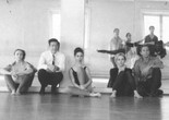 Rehearsal at Merce Cunningham&#39;s studio, 1964. Left to right, seated: Barbara Dilley Lloyd, John Cage, Sandra Neels, Shareen Blair, and Robert Rauschenberg. Left to right, standing: MC, Carolyn Brown, Steve Paxton, William David, and Viola Farber. Photo: Robert Rauschenberg © Robert Rauschenberg Foundation