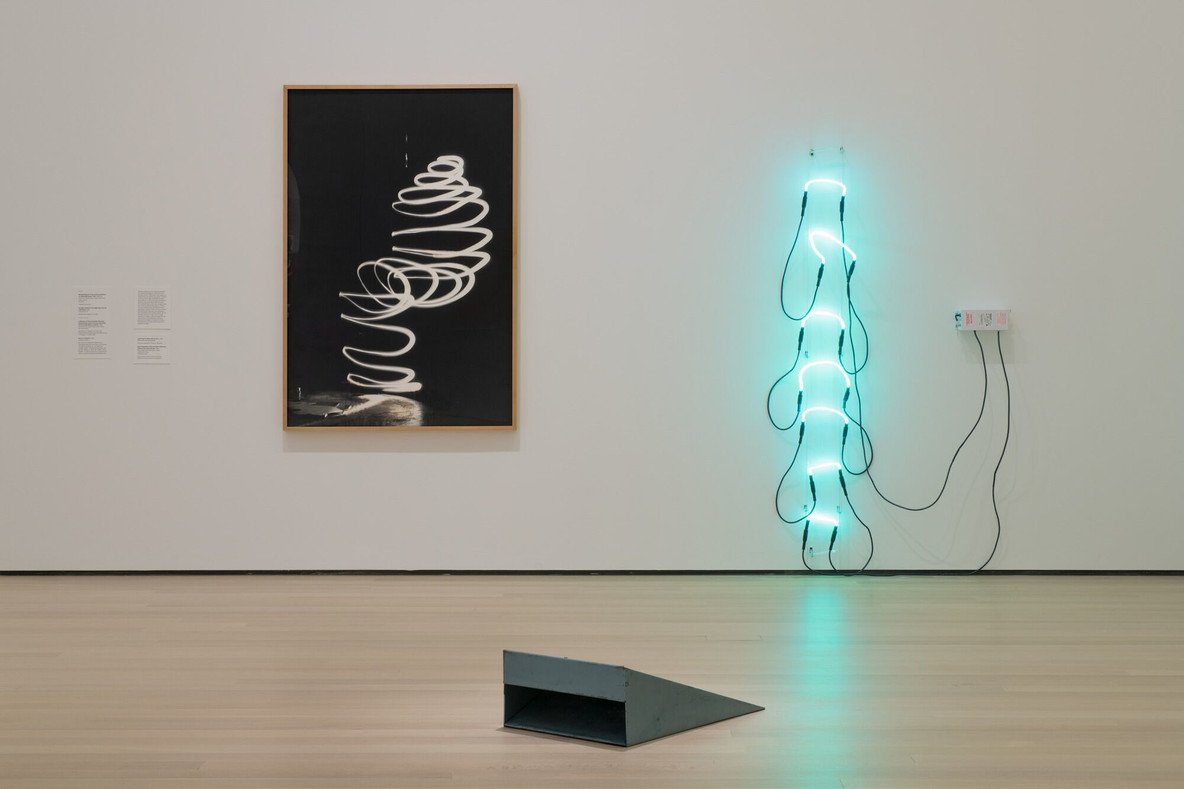 Bruce Nauman. Neon Templates of the Left Half of My Body Taken at Ten-Inch Intervals. 1966; with Light Trap for Henry Moore, No. 1. 1967; and Device to Stand In. 1966