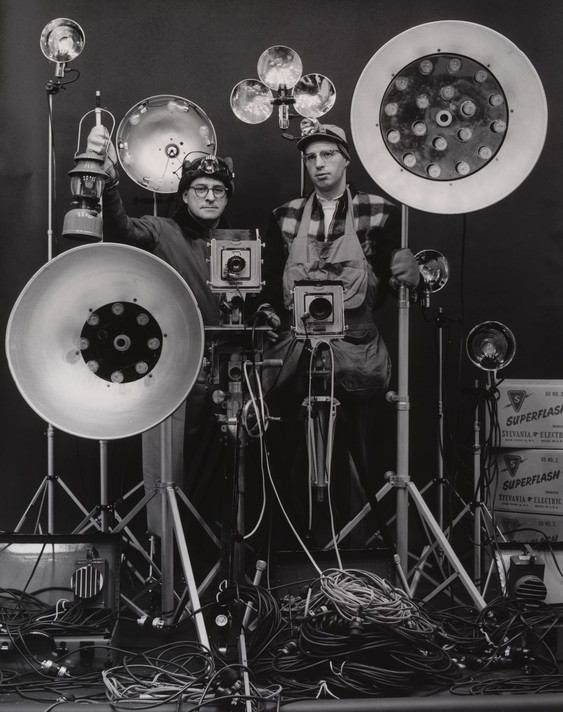 O. Winston Link. O. Winston Link and George Thom with Part of Equipment Used in making Night Scenes with Synchronizer Flash. March 16, 1956.