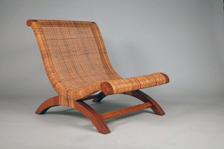 Clara Porset. Butaque. c. 1957. Laminated wood and woven wicker, 28 3/4 × 25 13/16 × 33 7/16&#34; (73 × 65.6 × 84.9 cm). Gift of The Modern Women’s Fund
