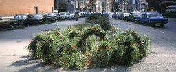 Becky Howland. Tied Grass. 1977. Photograph by Howland of site-specific installation on traffic island bounded by Franklin Street, Varick Street, and West Broadway. Courtesy the artist. © 1977 Becky Howland