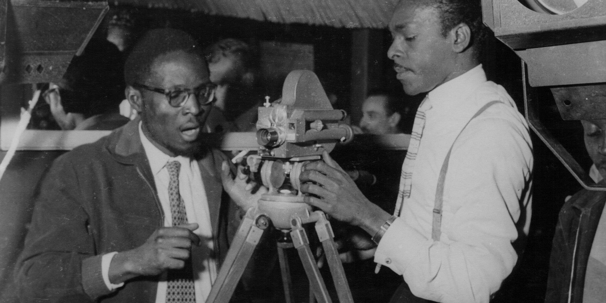 Paulin Soumanou Vieyra (left) and Robert Caristan on the set of Afrique sur Seine, 1955. Image courtesy Stéphane Vieyra